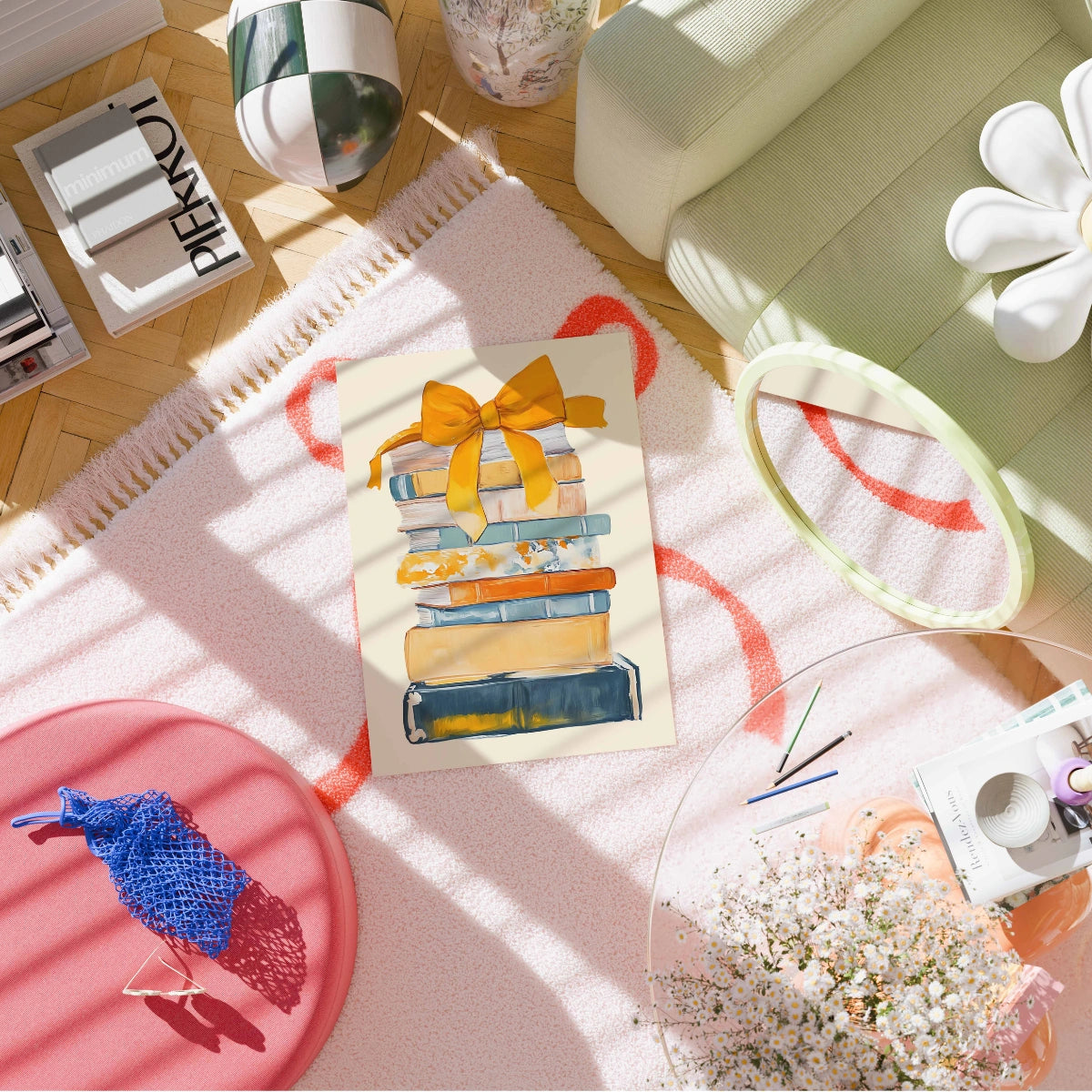 Bücherstapel mit orangefarbener Schleife – Farbenfrohe Wanddekoration für Bücherliebhaber